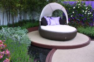 round-cane-seat-with-cushion-and pillows